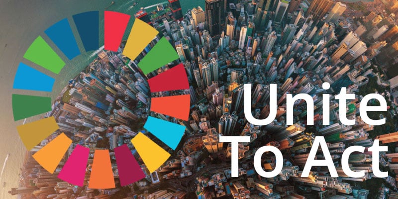 Circular SDG logo over a city, with the phrase 'Unite to Act' signifying collective action for sustainable goals.