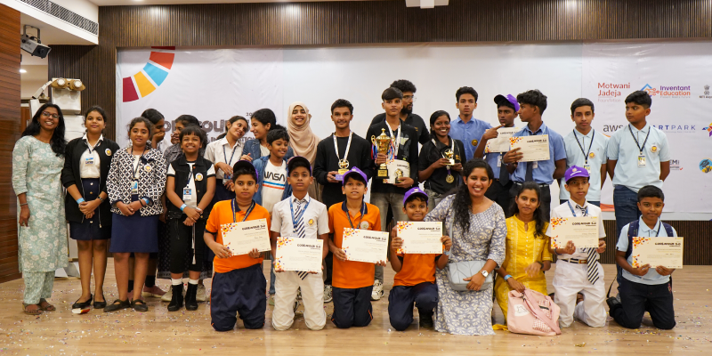 Group of students and mentors posing with awards at Codeavour 5.0 National Coding competition